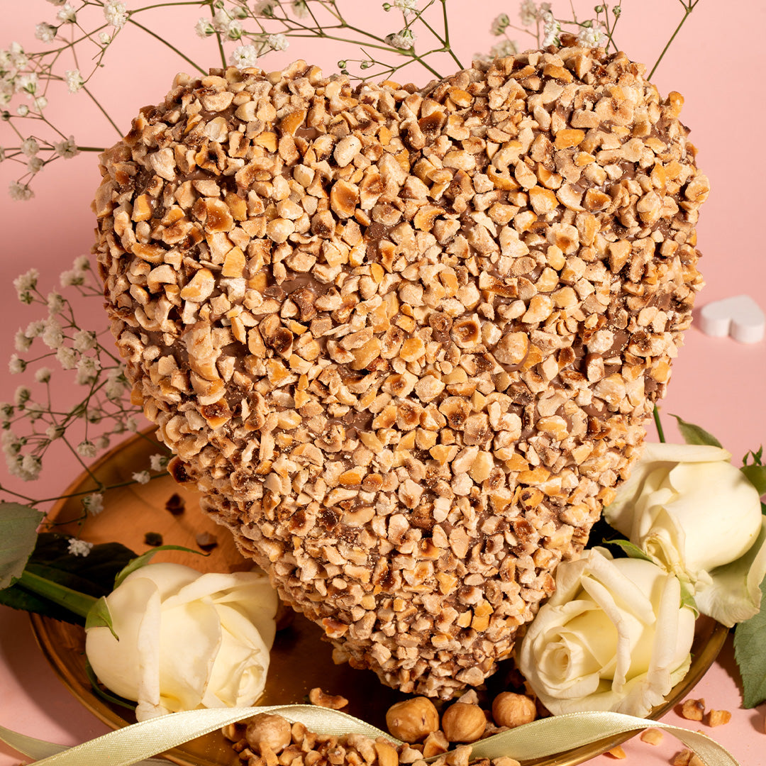 CUORE AL CIOCCOLATO CON GRANELLA DI NOCCIOLE 600 GR.