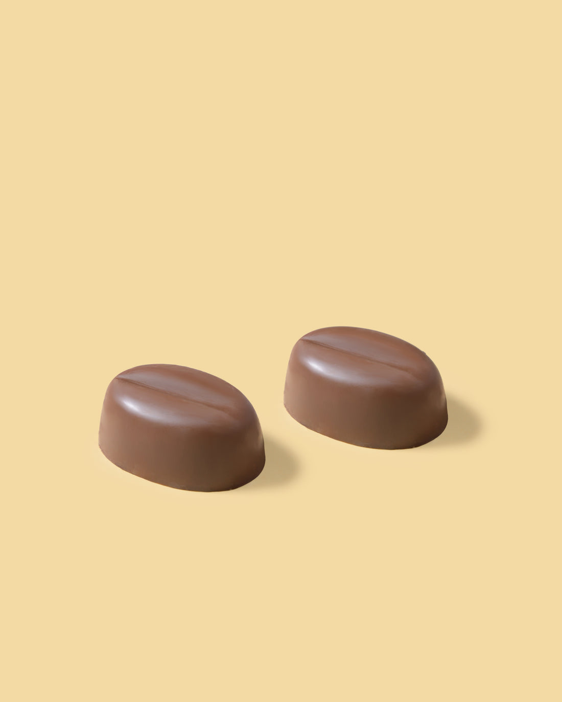 Pralina di cioccolato al latte ripiena di crema al caffè