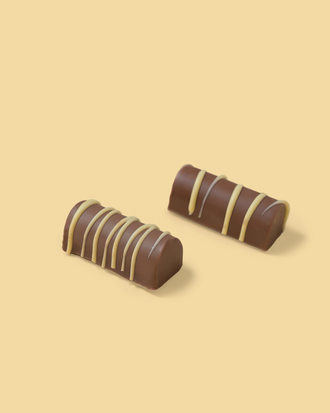 Praline di cioccolato al latte con nocciole intere